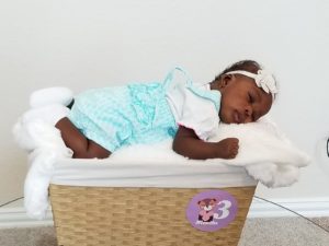 Baby Jayne 3 months old portrait in straw basket born from IVF Mexico