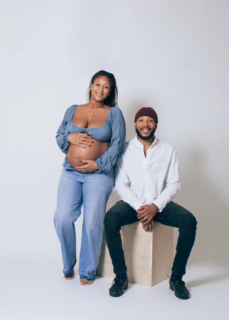 pregnant-couple-posing-after-fertility-care-at-liv