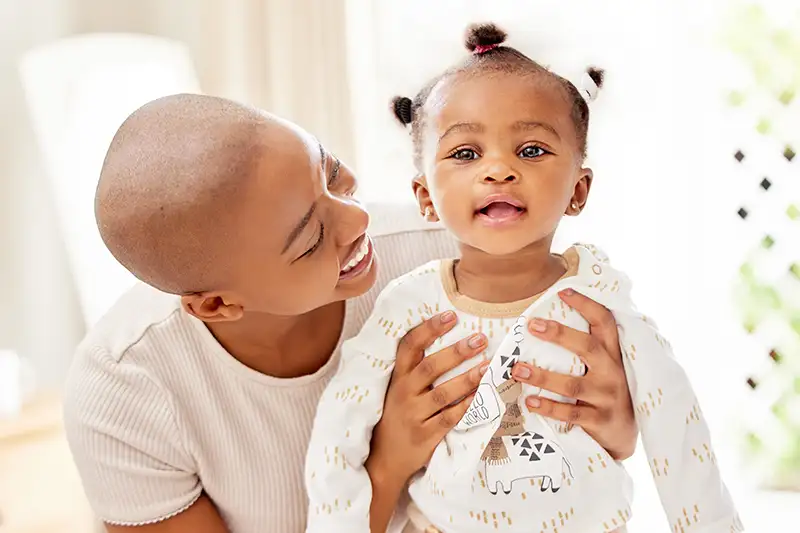 shot-of-a-mother-bonding-with-her-baby-daughter-fertility-after-cancer